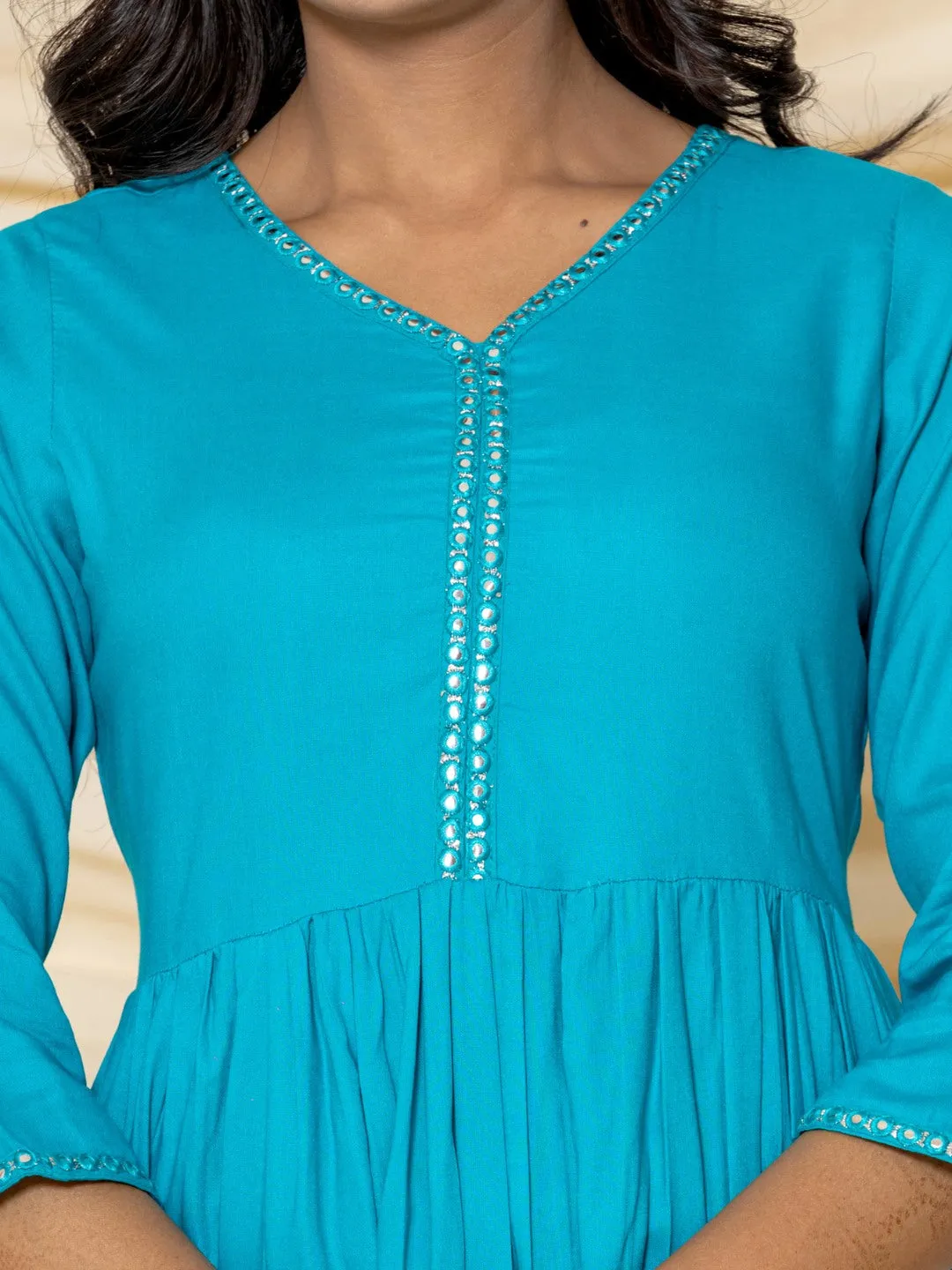 Solid Embroidered Peplum Top - Turquoise